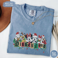 a blue shirt with mickey and friends on it