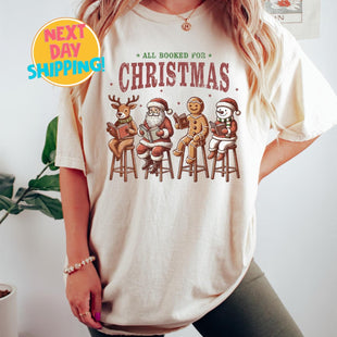 All Booked for Christmas Comfort Colors Shirt, Book Lovers Shirt, Gift For Christmas, Vintage Santa Claus and Friends Reading