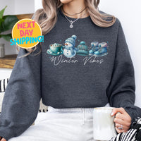 Winter Vibes Cozy Sweatshirt, Cute Winter Snowman Graphic Shirt, Warm Holiday Sweater, Hot Cocoa and Beanie Print, Winter Fashion