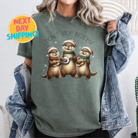 Comfort Colors Don’t Stop Believin Christmas Otter Shirt,  Otters Merry Christmas Shirt, Otter Lover Christmas Gift, Sea Animal Christmas