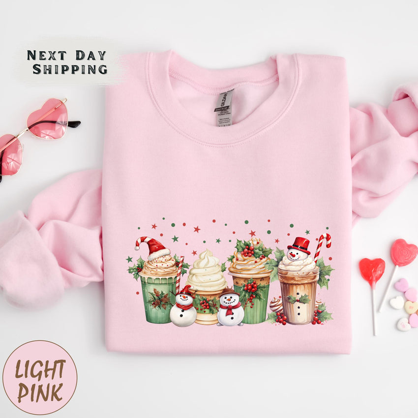 a pink shirt with a picture of cupcakes on it