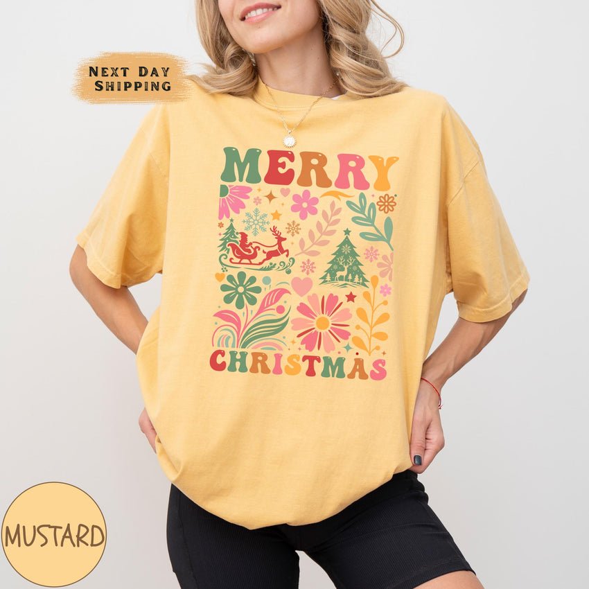 a woman wearing a yellow merry christmas t - shirt