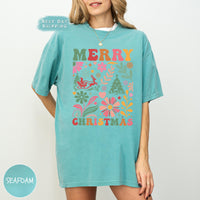 a woman wearing a merry christmas t - shirt