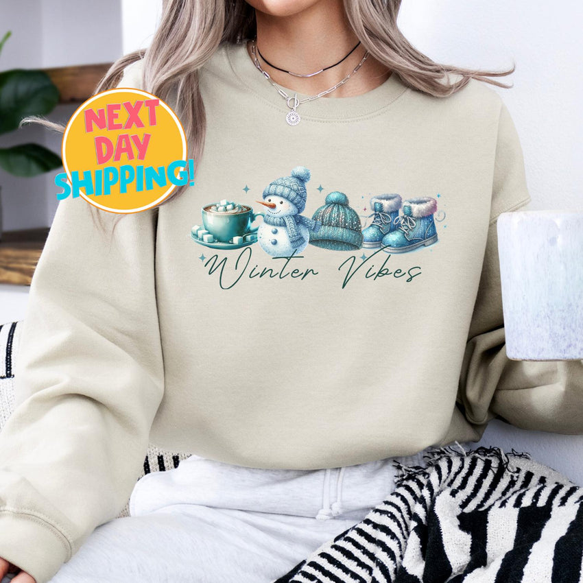 Winter Vibes Cozy Sweatshirt, Cute Winter Snowman Graphic Shirt, Warm Holiday Sweater, Hot Cocoa and Beanie Print, Winter Fashion