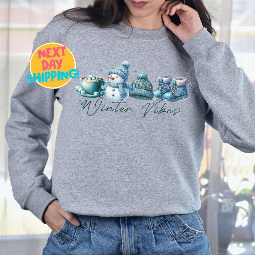 Winter Vibes Cozy Sweatshirt, Cute Winter Snowman Graphic Shirt, Warm Holiday Sweater, Hot Cocoa and Beanie Print, Winter Fashion