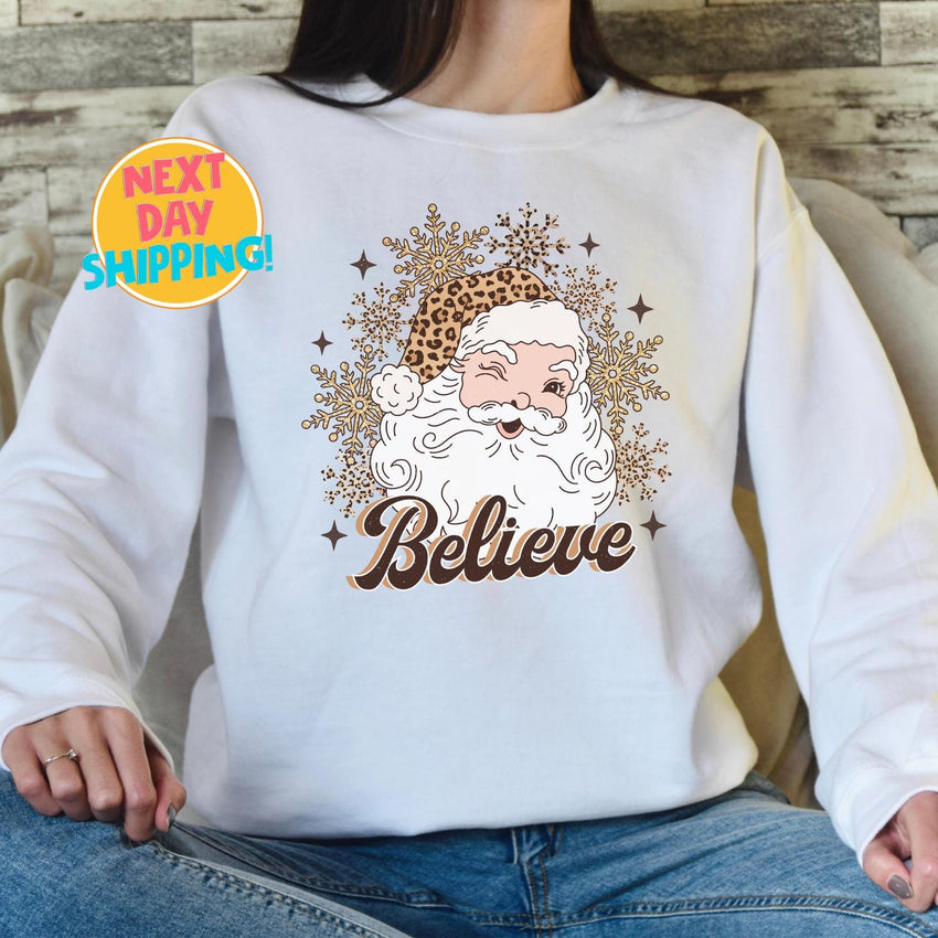 Believe Leopard Santa Sweatshirt, Retro Christmas Graphic Sweater, Holiday Santa Shirt, Cute Leopard Print Santa Top Cozy Christmas Pullover