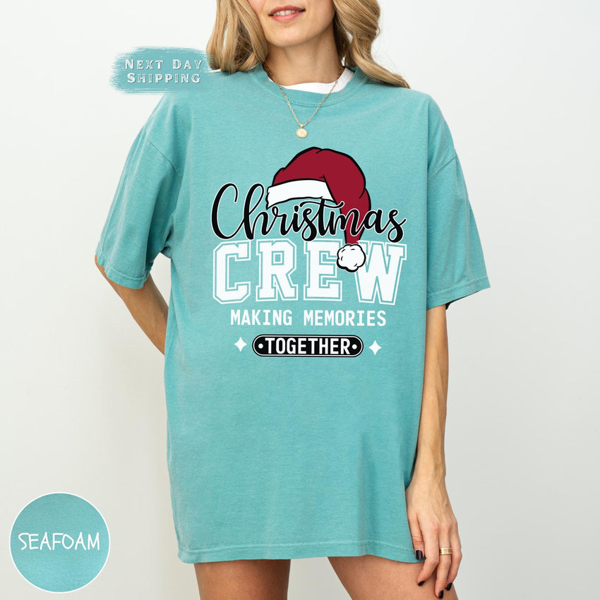 a woman wearing a christmas crew t - shirt