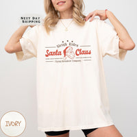 a woman wearing a santa clause t - shirt