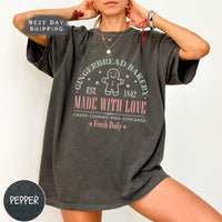 a woman wearing a t - shirt that says gingerbread parlor made with love